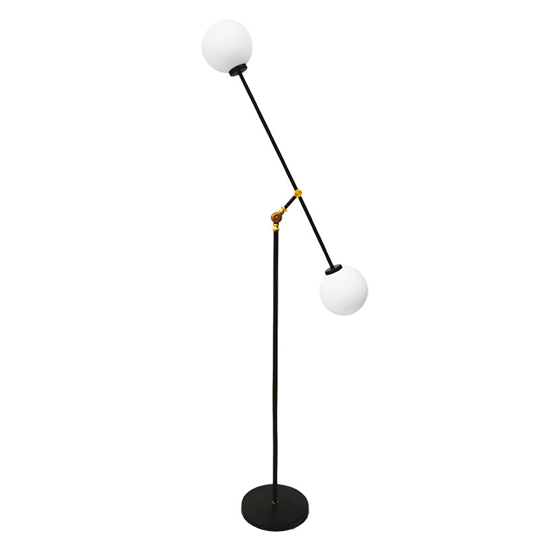 Lámpara Pie de Salón, armazón metálico en acabado negro, brazo articulado, 2 luces, con difusores de vidrio soplado.